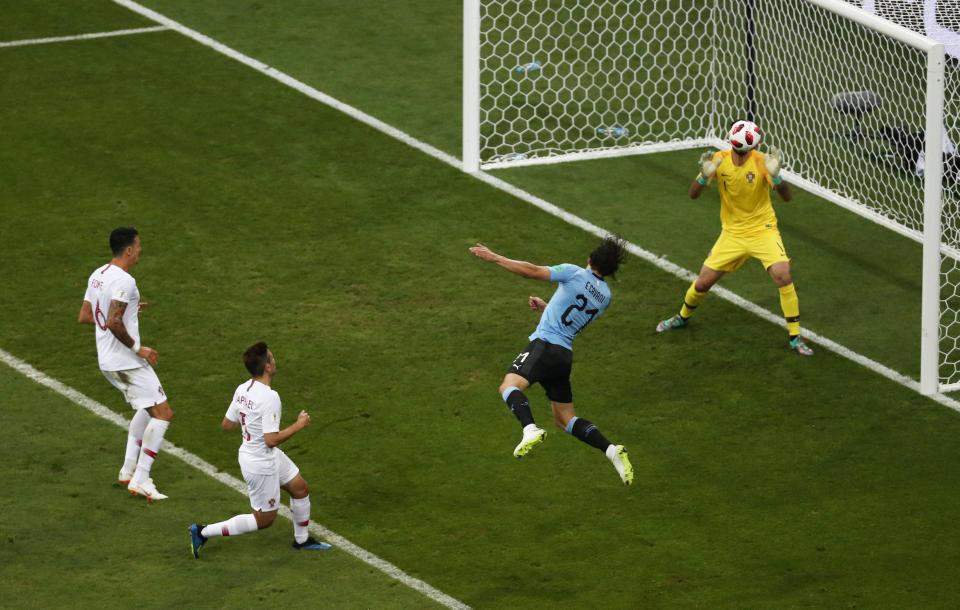  Edinson Cavani gave Uruguay the lead with a flying header