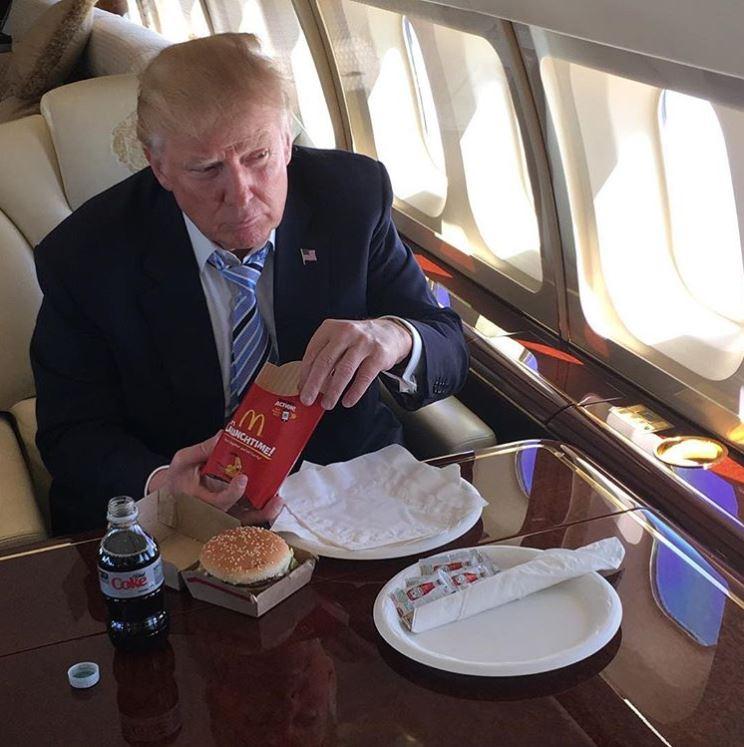  The President, who is a fan of McDonald's burgers, was spotted with half a burger bun at a recent lunch