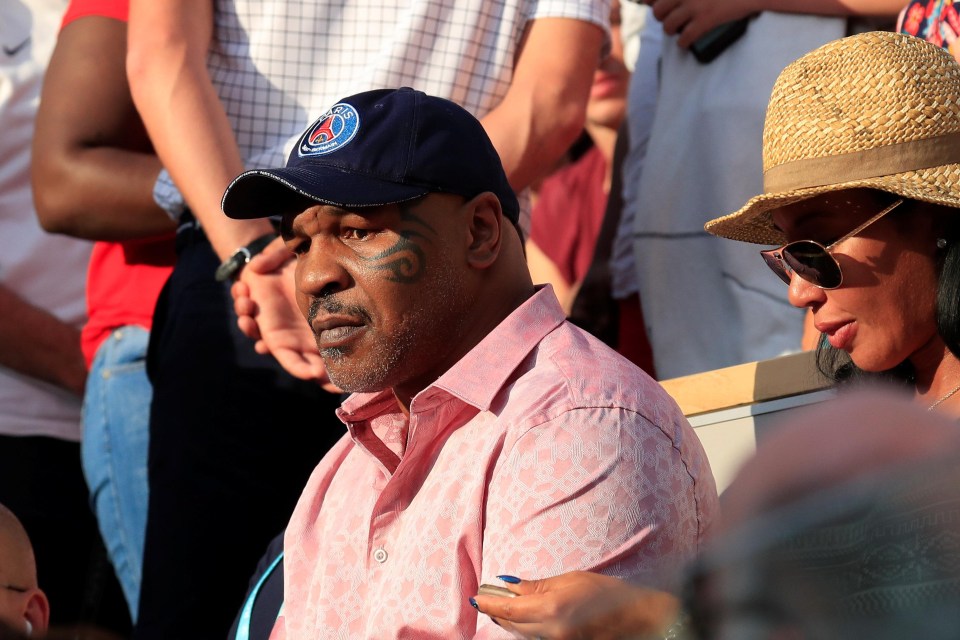 Mike Tyson watched the action from the stands in Paris