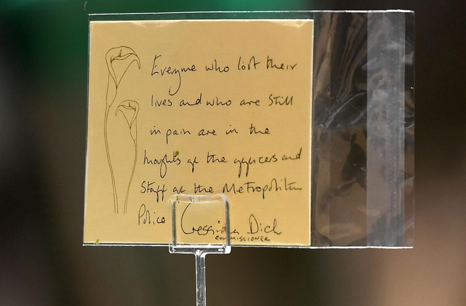  A message written on a floral tribute by Cressida Dick, Commissioner of the Metropolitan Police Service is displayed at Southwark Cathedral