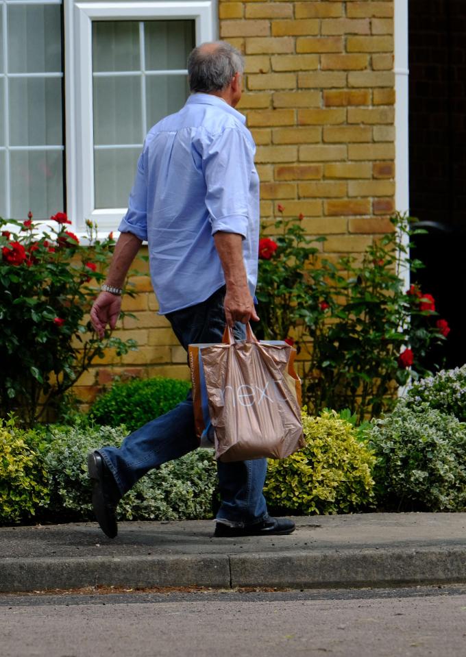  Andrew Newton pictured arriving at his partner's home in Dorking, Surrey