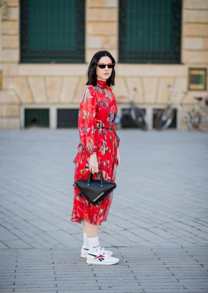  The street style girls are teaming trainers and socks with floral dresses