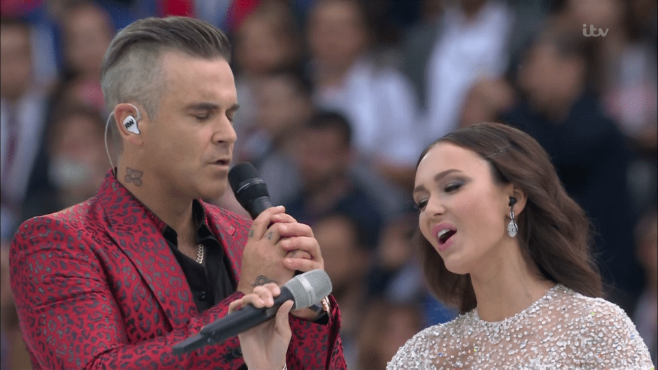  Robbie with Russian soprano Aida Garifullina as he kicks off the World Cup