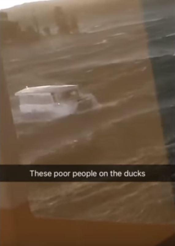  In footage taken by a witness on shore, one of the duck boats can been seen being lashed by strong waves