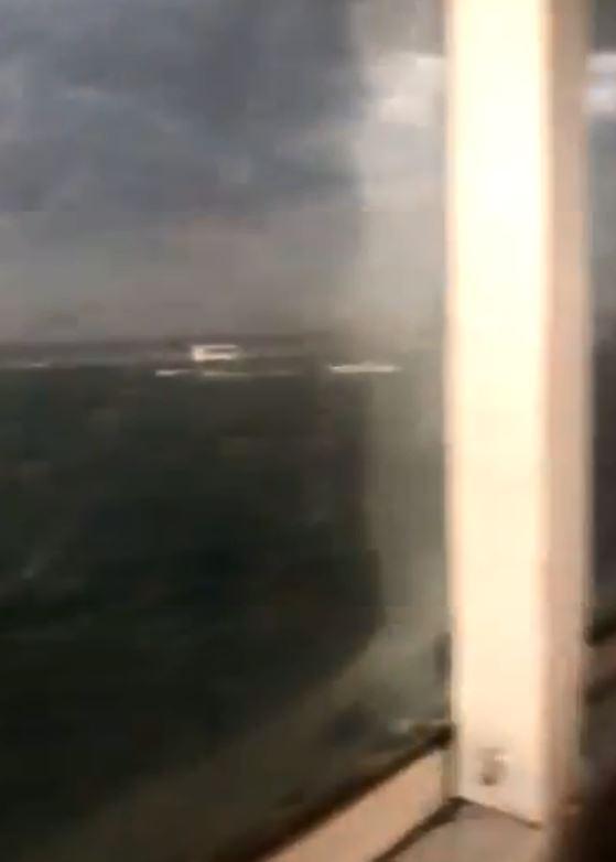  In grainy footage shot by a passenger in the other boat, the doomed duck boat can be seen being tossed by the rough water