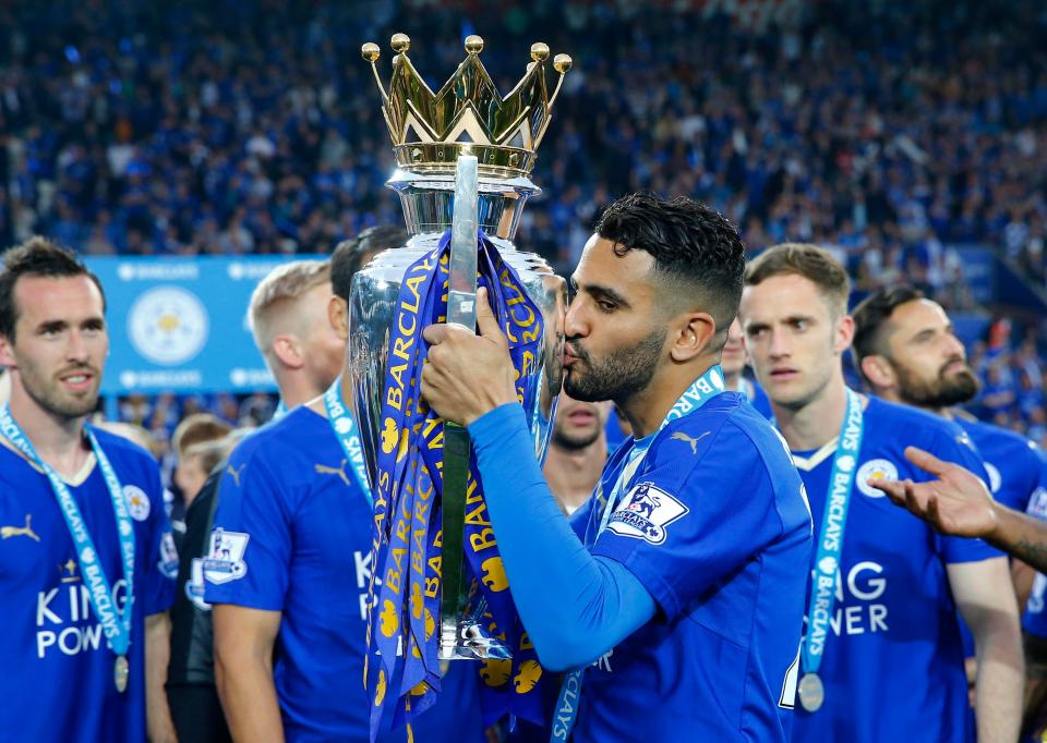  Riyad Mahrez got his hands on the Premier League trophy after Leicester's incredible title triumph in 2015-16