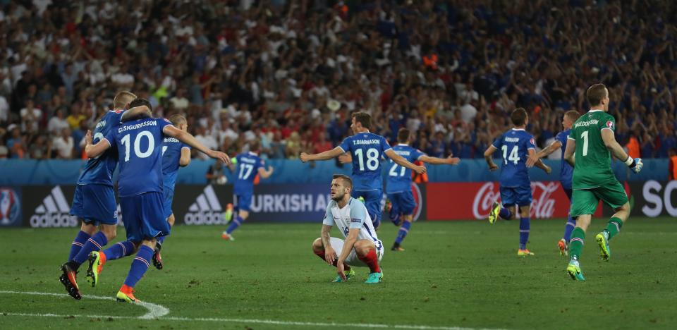  Wilshere reacts after the shock defeat to Iceland at Euro 2016