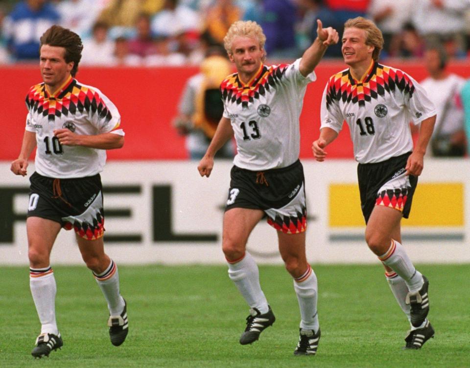  Klinsmann, right, played in three World Cups and lifted the trophy in 1990