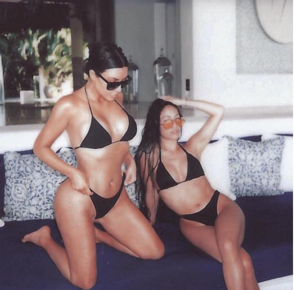  The Kardashian/Jenners are big fans of the straddle, as Kim Kardashian proves here