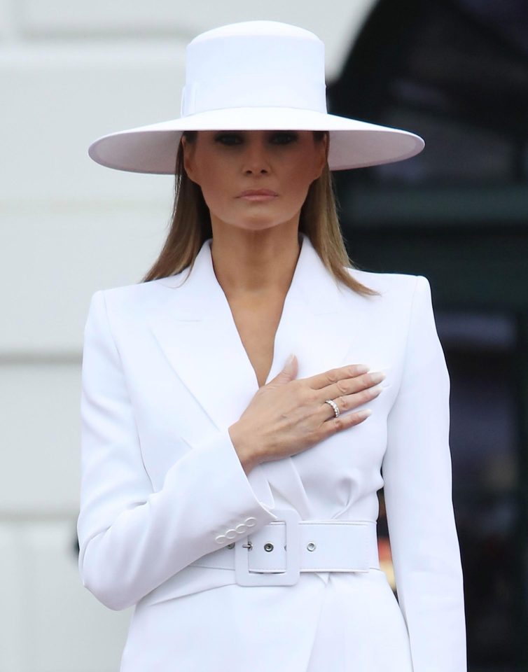  Melania wore a white suit to greet the French president