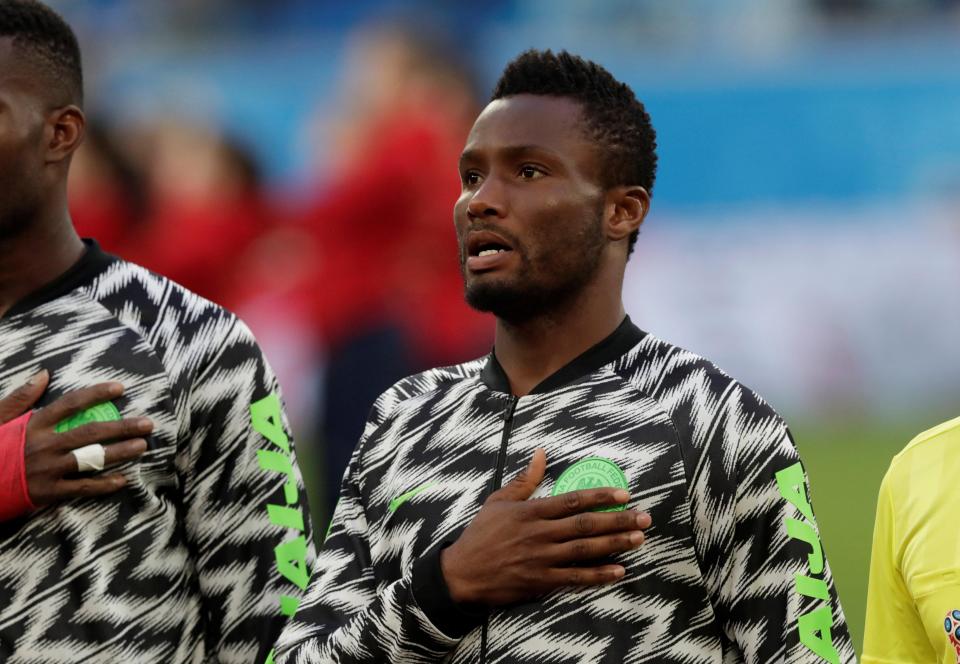  Mikel sings the Nigerian national anthem - as he claimed he did not want to let his countrymen down