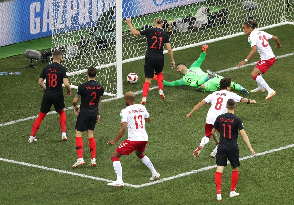  Mathias Jorgensen gives Denmark an early lead against Croatia after passing through a number of bodies and into the net