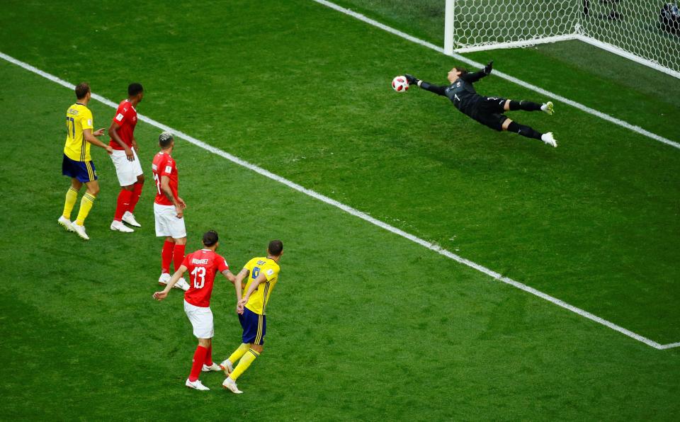  Switzerland goalkeeper Yann Sommer makes an exquisite save to keep out Marcus Berg