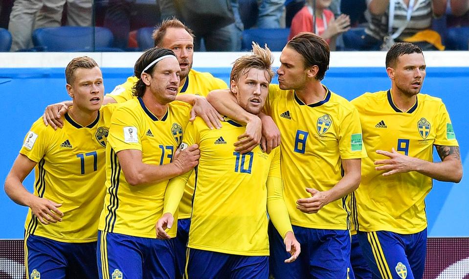  Sweden celebrate after their opening goal against Switzerland