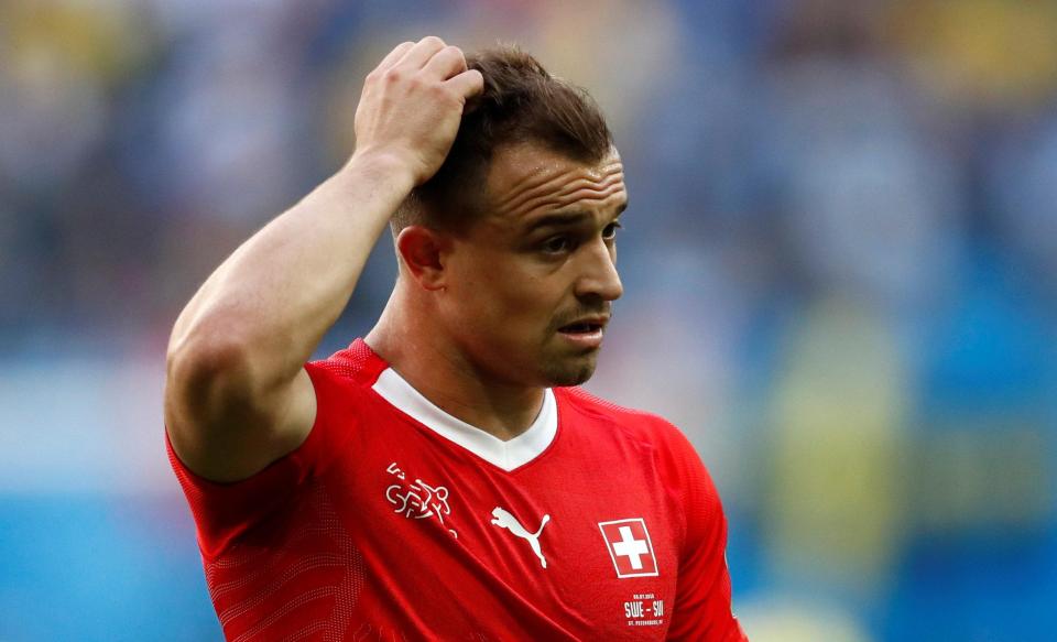  Stoke ace Xherdan Shaqiri looks dejected after Switzerland crashed out of the World Cup