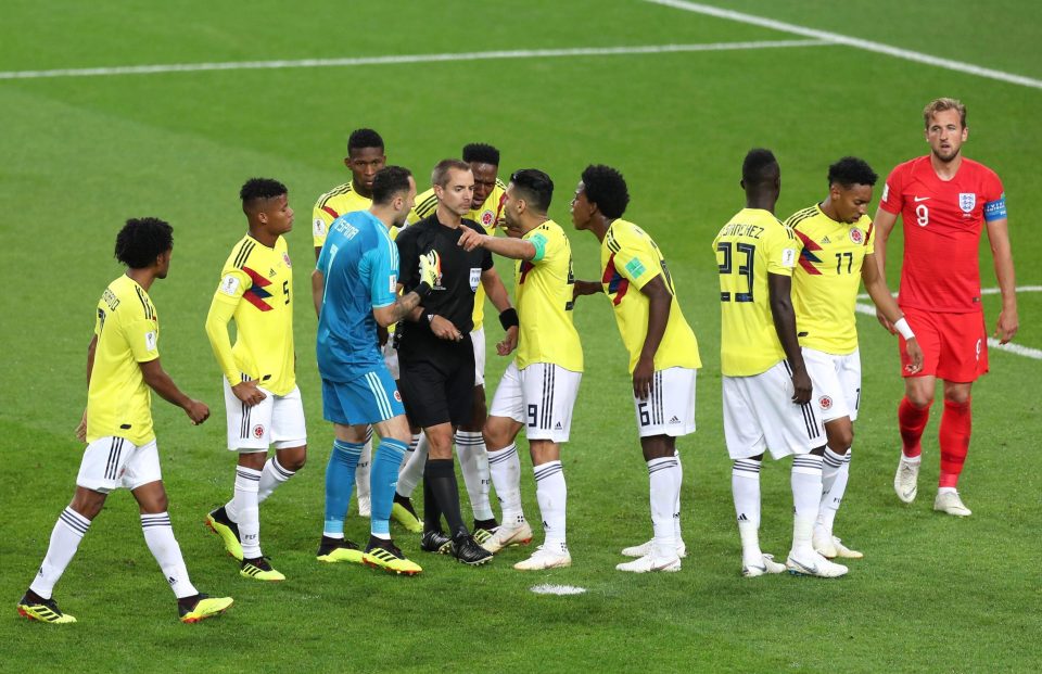  The referee was distracted as the players tried to sabotage the penalty spot