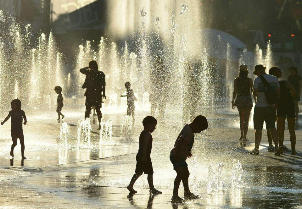  These kids take the chance to cool off in Montreal, Canada