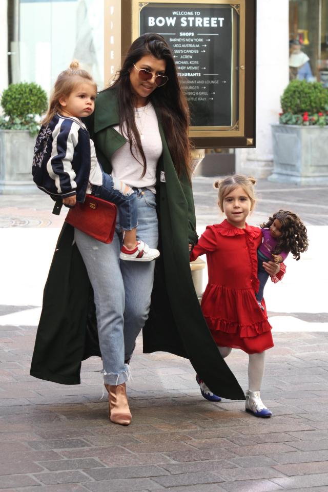  Penelope in a red Gucci dress