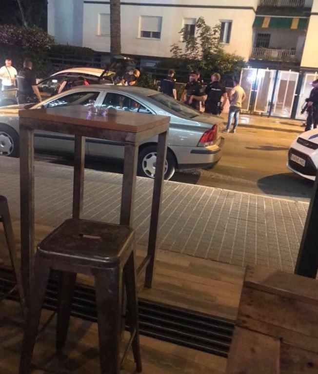  Police officers, above, near the scene in which an innocent Brit tourist was shot