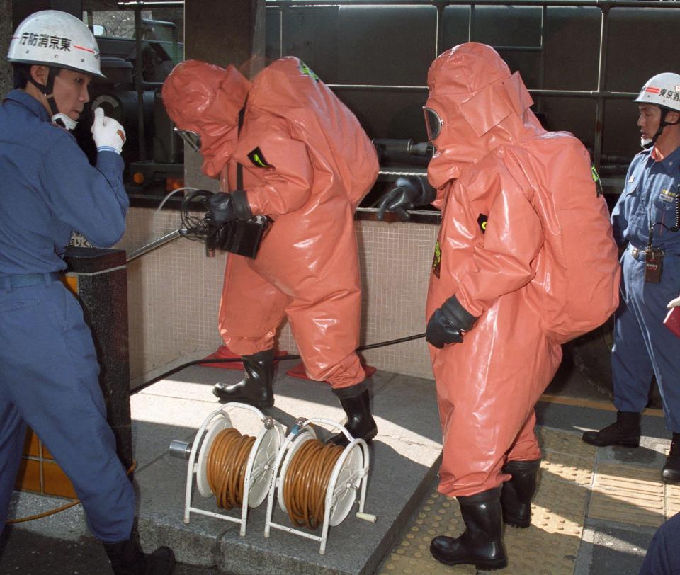  Fire crews brave the toxic gas filled subway tunnels after a death cult launched a deadly Sarin attack