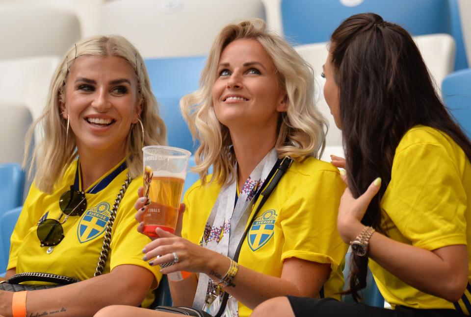  Mikael Lustig's wife Mikael Lustig and Sebastian Larsson's partner Tina Loonberg were all smiles at the Samara Arena