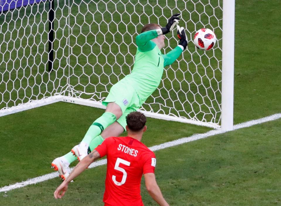  Pickford gets his hand to the header and England stay ahead