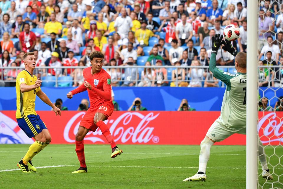  Alli watches his header fly into the net as he rewarded the faith in keeping him in the side with his first goal of the tournament