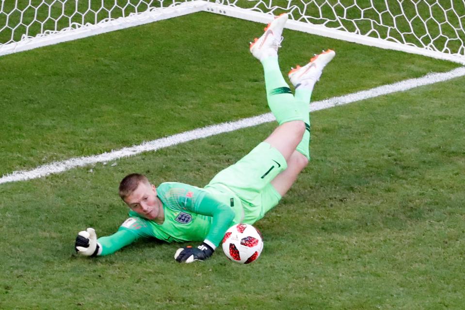  Pickford completes the save as the England keeper does his bit to earn a semi-final spot