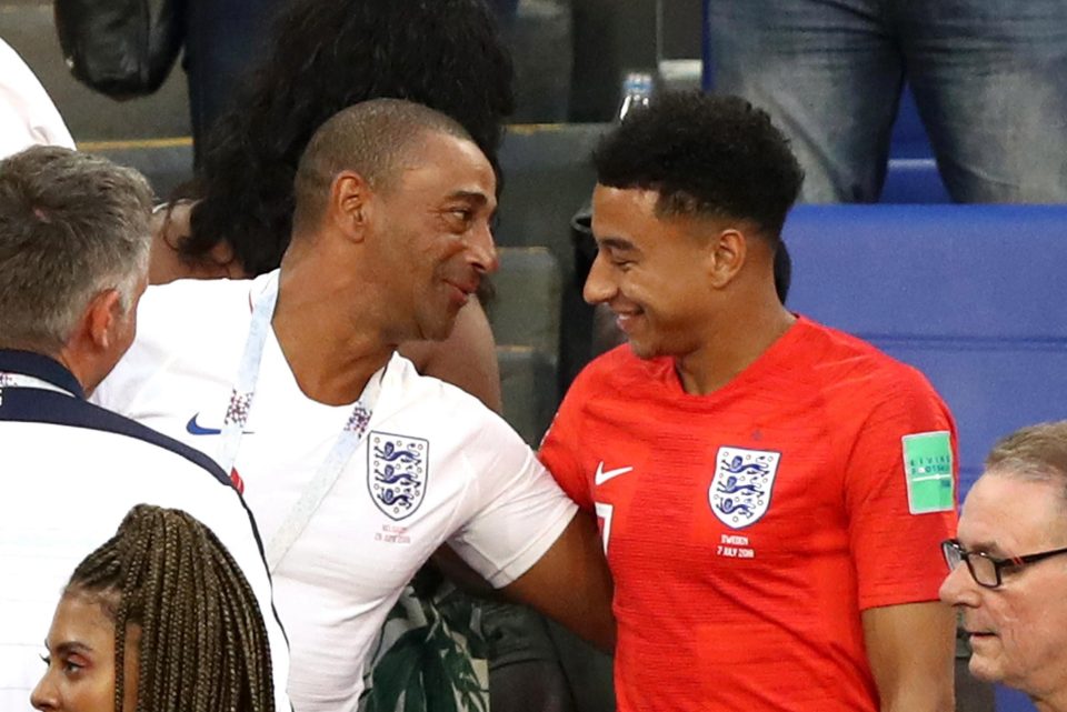  Lingard celebrates with family in the stands after helping England to the semi-finals