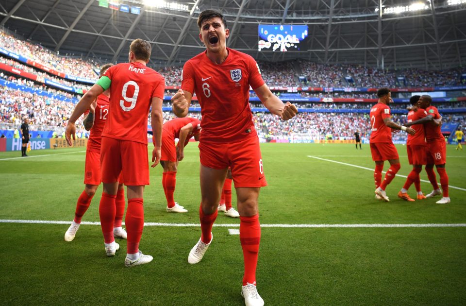 Harry Maguire celebrates sending England ahead against Sweden