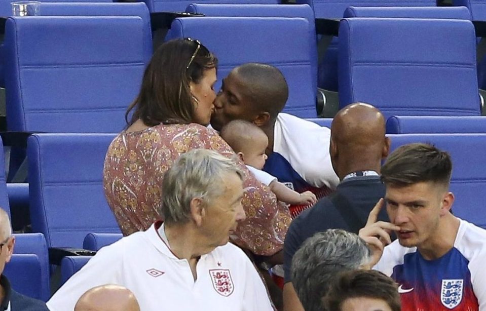  Left back Ashley Young greeted his wife Nicky Pike and their baby in the stands