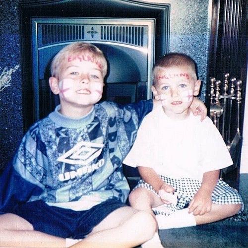  Harry Kane, right, watching England with big brother Charlie as a kid