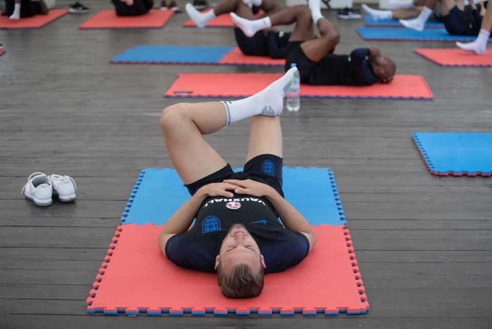  Kane lies down and stretches his legs in Repino