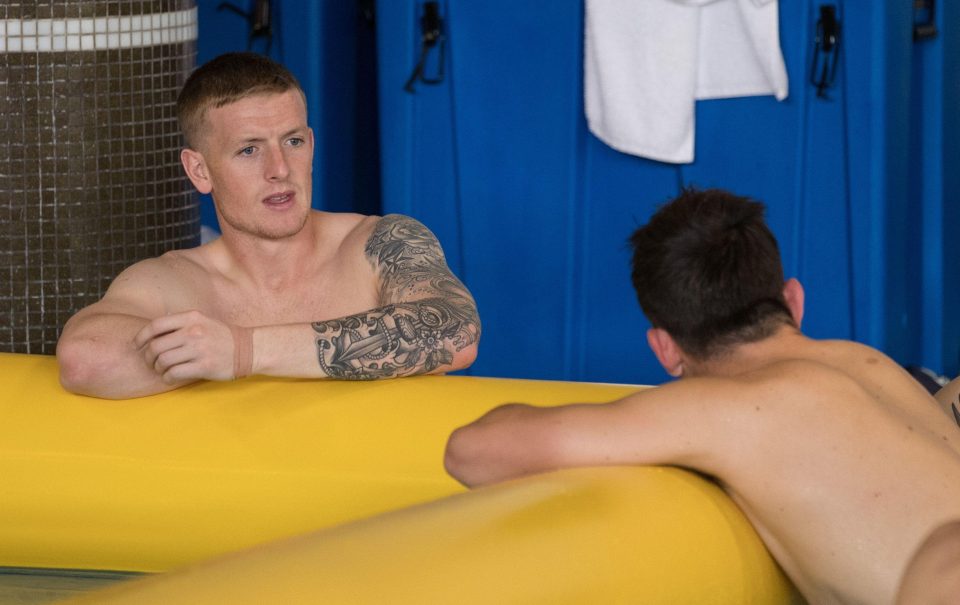  Pickford relaxes after more heroics during Englands quarter-final against Sweden