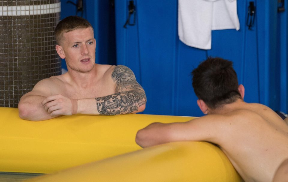 Pickford and Harry Maguire chill in the pool at Englands World Cup hotel in Repino