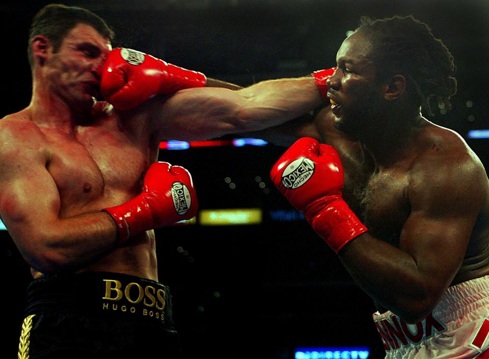 Crowds in the US were stunned as Vitali Klitschko was stopped in the sixth round by Lennox Lewis 