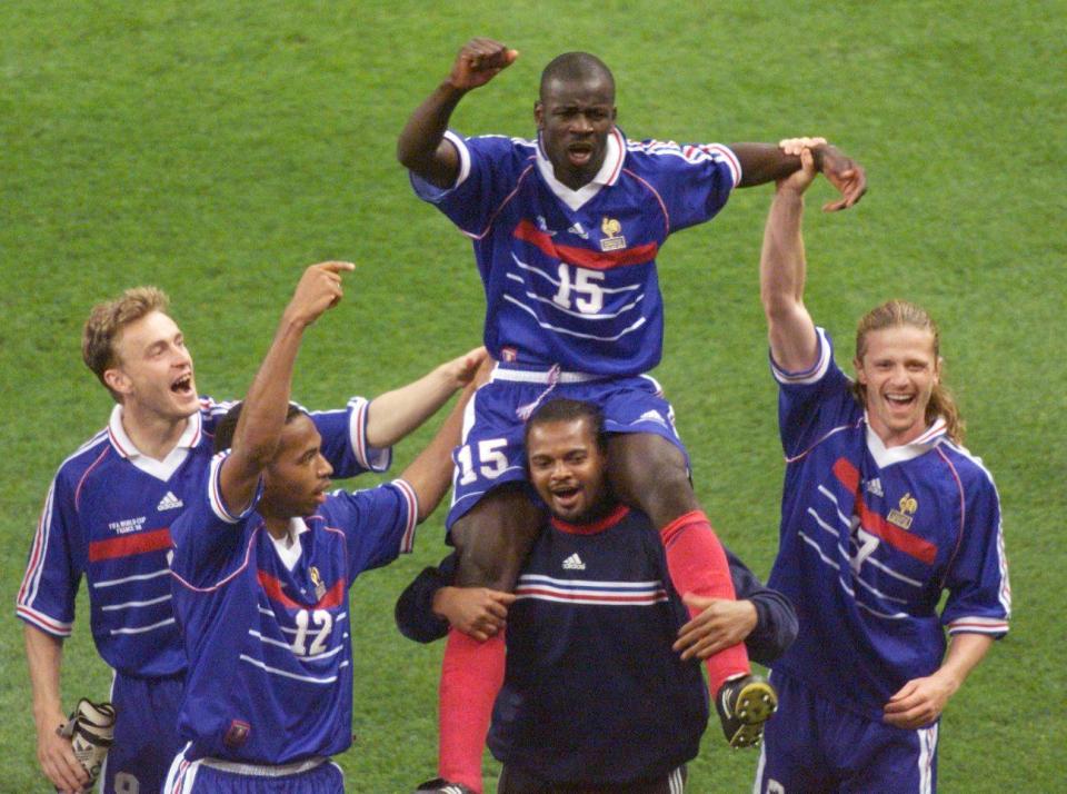  Lillian Thuram is lifted onto Bernard Lama's shoulders to celebrate his brace against Croatia that secured a place in the World Cup final in 1998