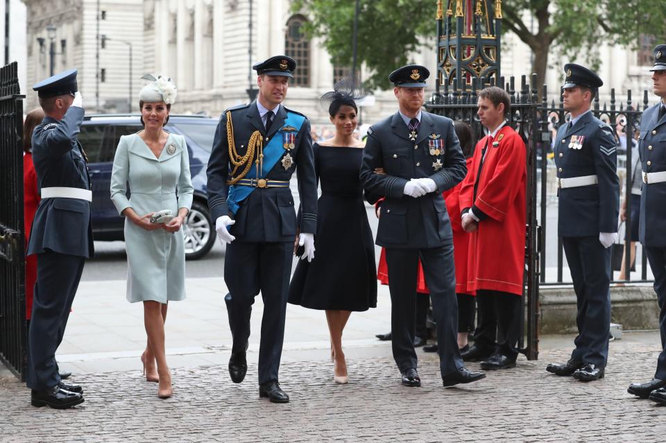 The Duke and Duchess of Sussex walk beside the Duke and Duchess of Cambridge to recognise the RAF today