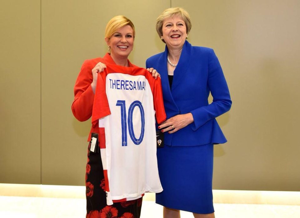 Prime Minister Theresa May poses with a Croatia shirt alongside her fellow premier Kolinda Grabar-Kitarovic 