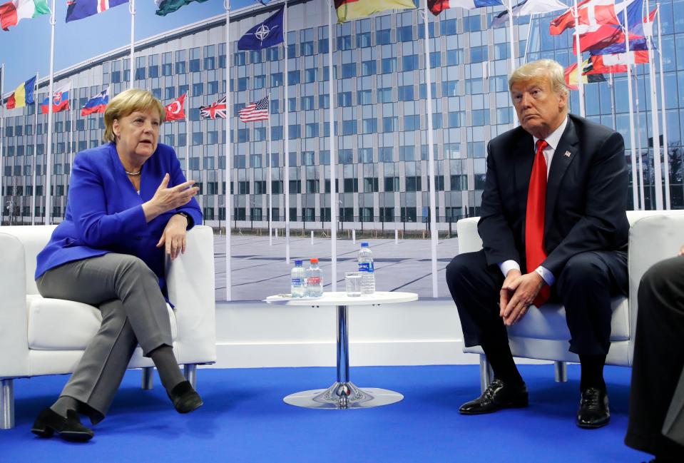  Donald Trump pictured with Germany Chancellor Angela Merkel