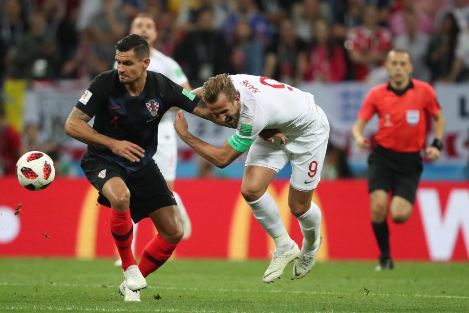 Dejan Lovren sends Harry Kane flying as England dominated play in the first half