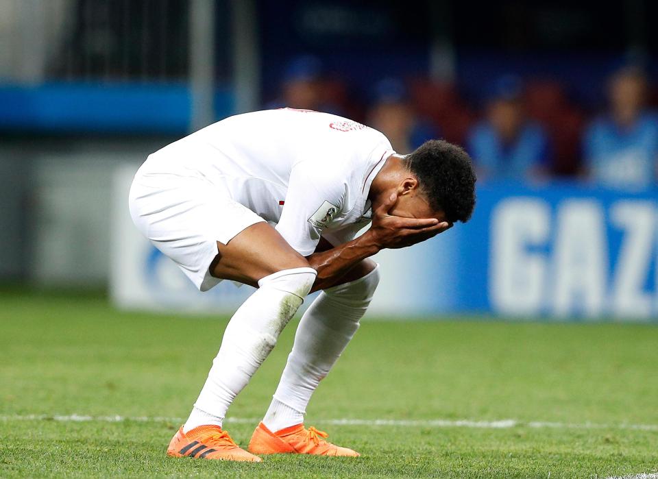 Jesse Lingard reacts to the full-time whistle as England were knocked out against Croatia