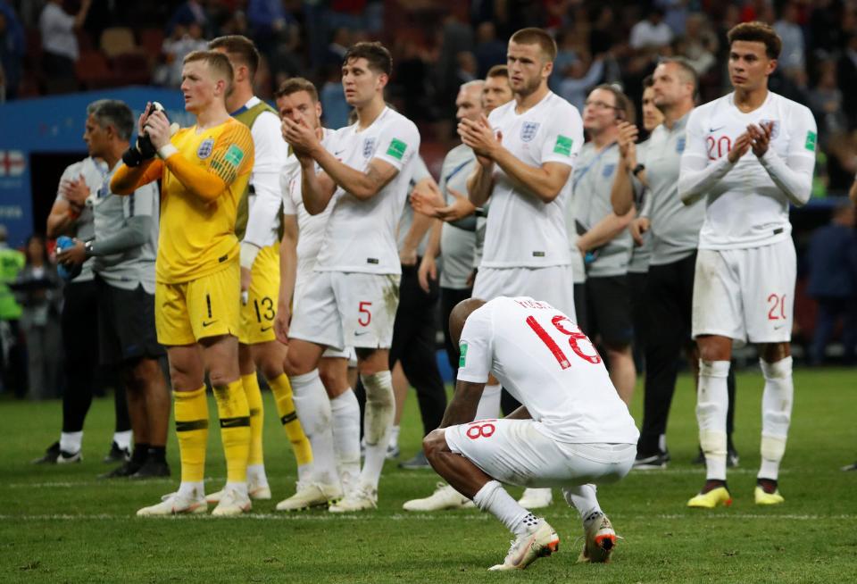 England is met with cheers from supporting fans after losing to Croatia