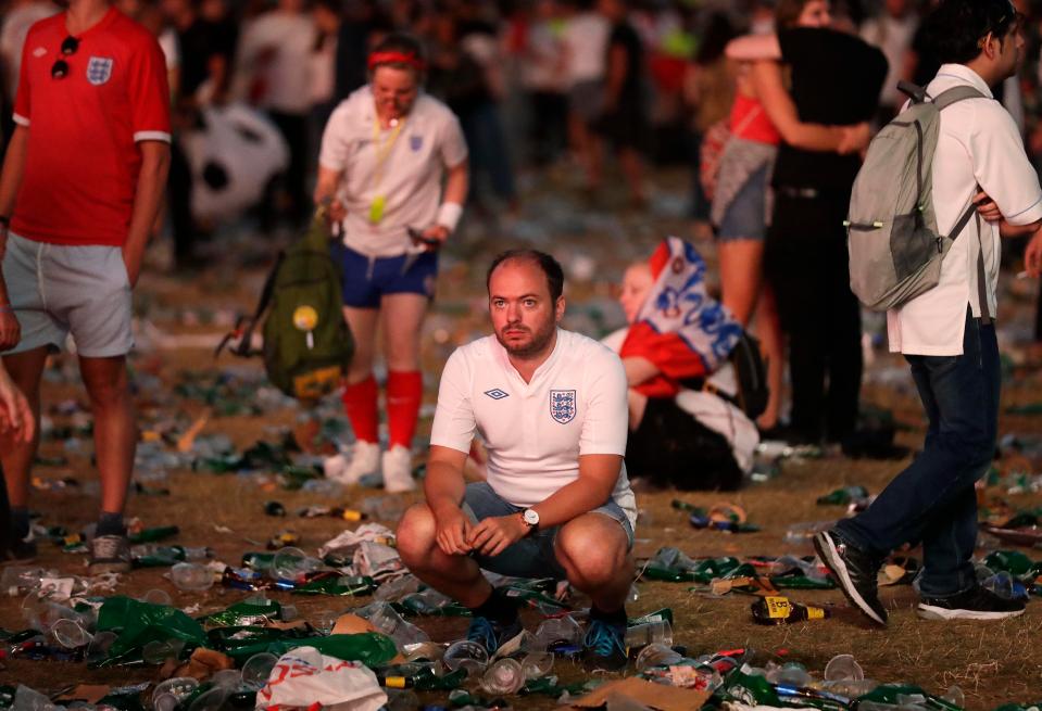 Fans surveyed the aftermath of England's World Cup exit with empty beer bottles and plastic cups strewn everywhere