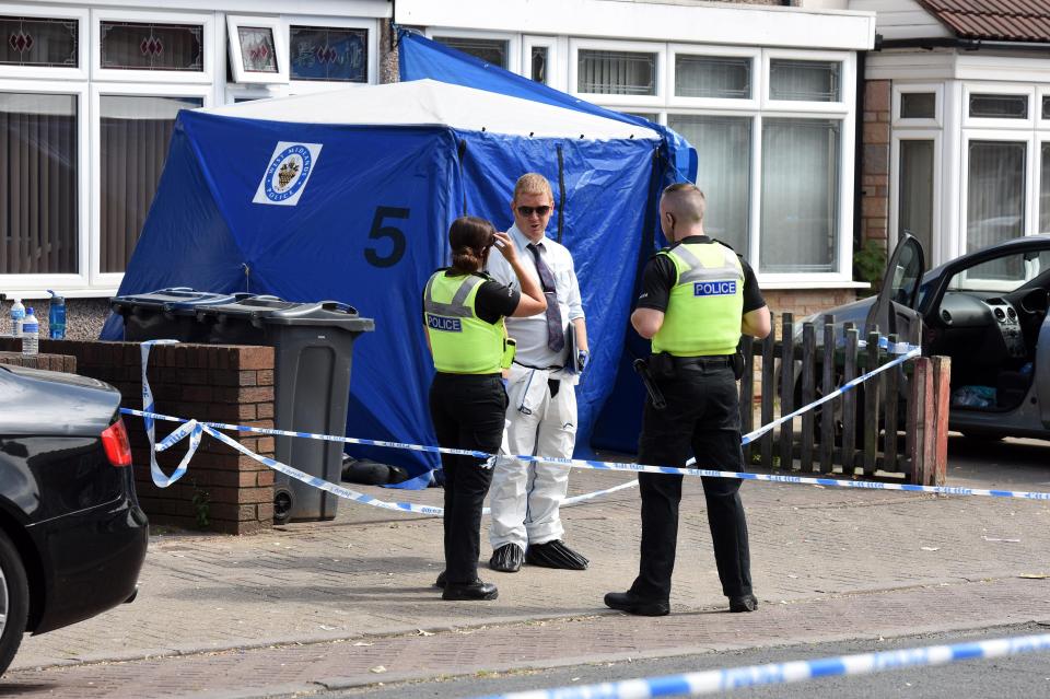  Police set up a blue forensic tent at the scene in Small Heath