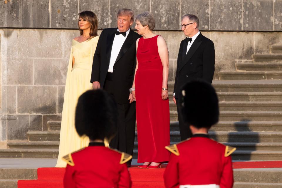  Theresa May opted for a red silk design while Melania chose buttercup yellow for the lavish state gala