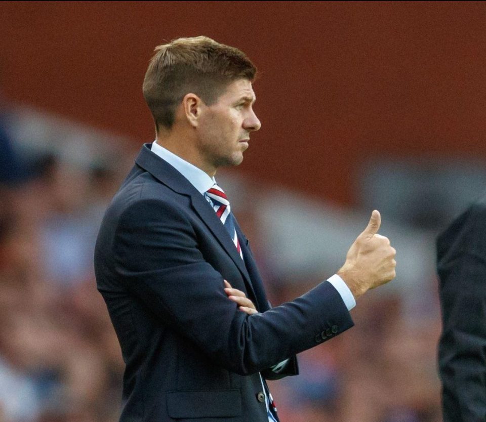  Steven Gerrard gives his Rangers side the thumbs up