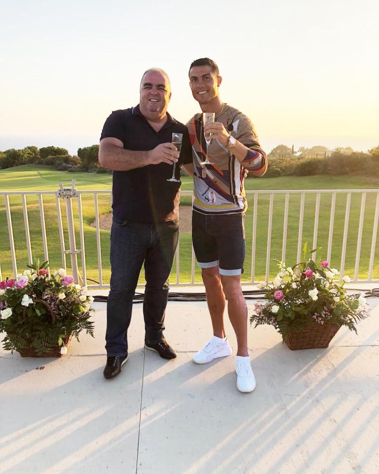  Cristiano Ronaldo and his mum's boyfriend Jose Andrade toast his Juventus move at the luxurious Costa Navarino resort