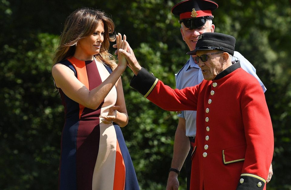  The First Lady looked relaxed as she high-fived a veteran while playing bowls