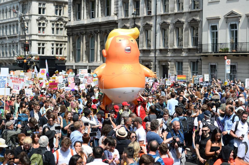  Crowds were were met by the controversial Mr Trump baby blimp, reinflated after it earlier soared above the capital for just two hours